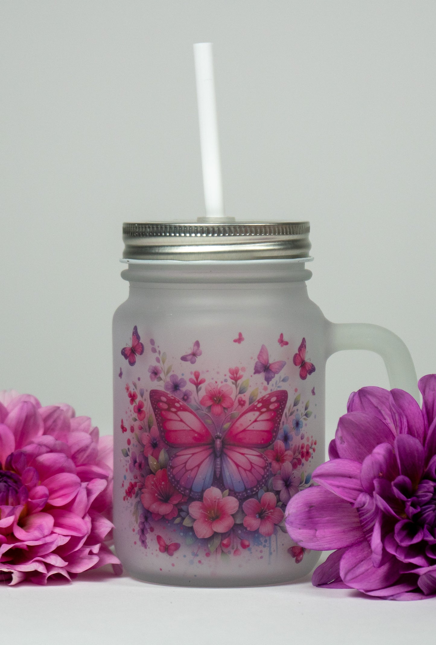 Glas Schmetterling mit Strohhalm